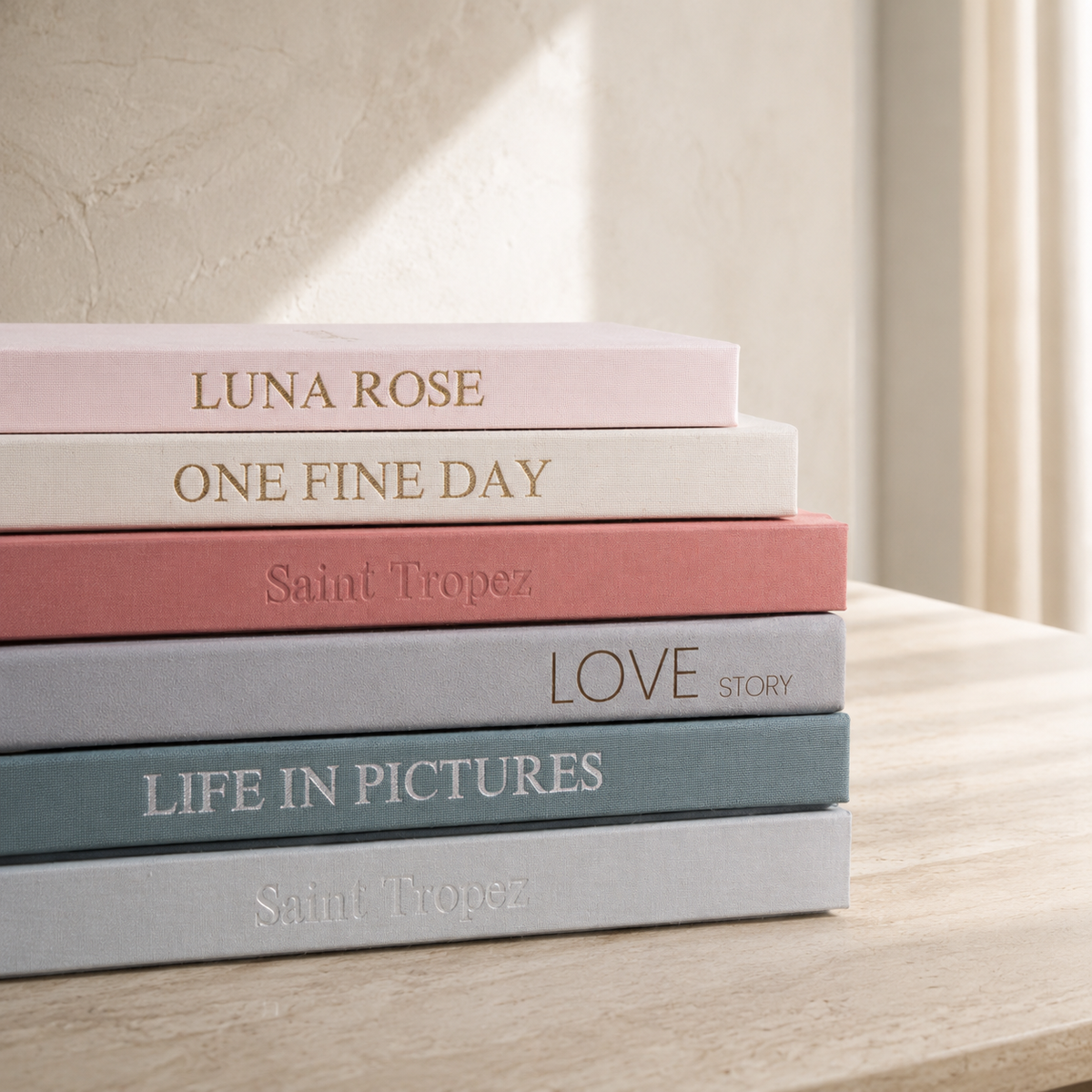A collection of personal volumes titled with chapters of life